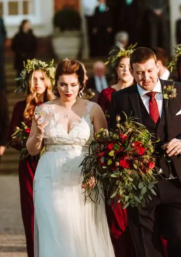 Red shower bouquet including eucalyptus. Andrew Keher Photographer
